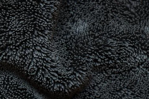 Black terry cloth background with loop texture, soft textile template for d.. Stock Photos