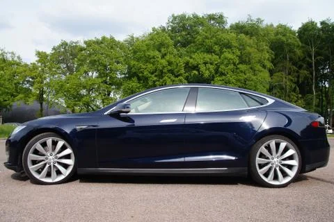Black Tesla Model S - side view Stock Photos
