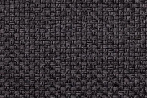 Black textile background with checkered pattern, closeup. Stock Photos