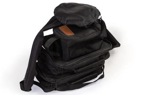 Black textile soft cases in form of bags different shape Stock Photos