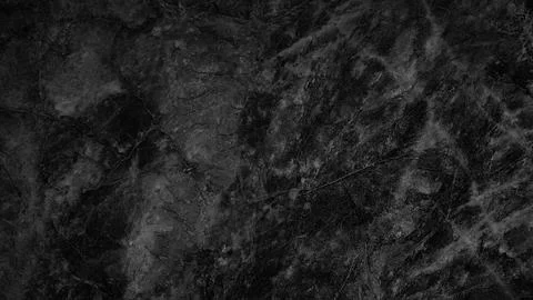 Black texture background of old wall with crack. Crack is long and wide. Back Foto stock