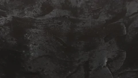 Black texture background. Top view. Loop motion. Rotation 360. Stock Footage 168531278