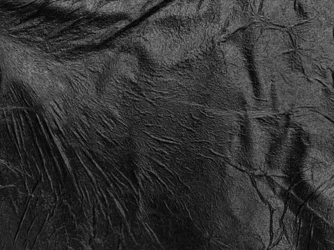 Black texture crumpled embossed background Stock-Fotos