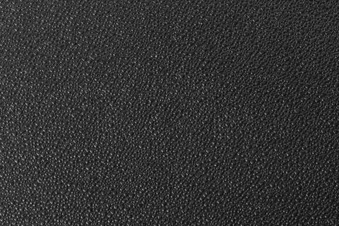 Black textured plastic surface Stock Photos