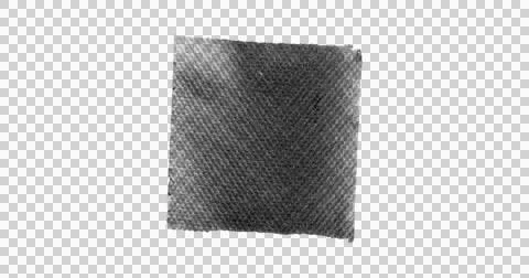 Black textured square fabric patch is floating in flat design style on Foto stock