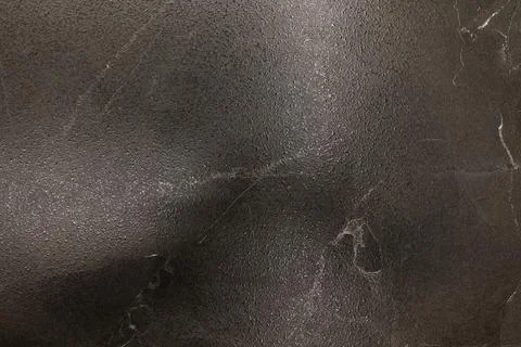 Black textured surface with subtle patterns, showcasing natural beauty and depth Stock Photos