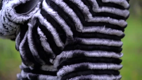 Black thick eco fur on the model. replacement of natural fur with eco-fur	 Video stock 229871793