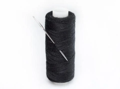 Black thread with needle Stock Photos