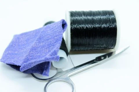 Black thread snort stools fabric arranged on a white background Stock Photos