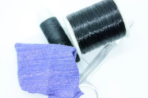 Black thread snort stools fabric arranged on a white background Stock Photos