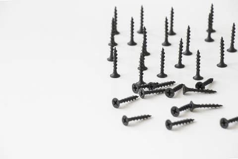 Black threaded screw on the white background, black and white colors Stock Photos