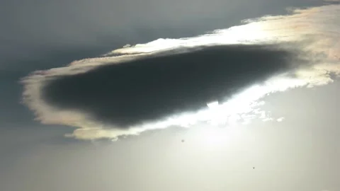 A black thundercloud covers the sun Stock Footage 237774976