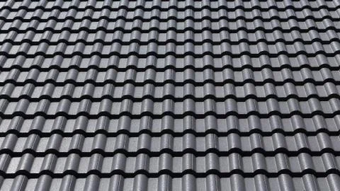 Black tiles roof on a new house Stock Photos