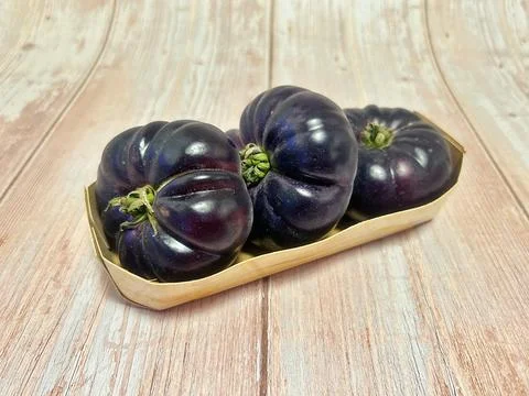Black tomatoes Stock Photos