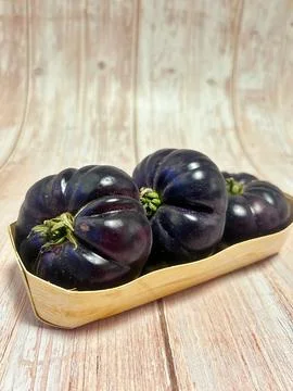 Black tomatoes Stock Photos