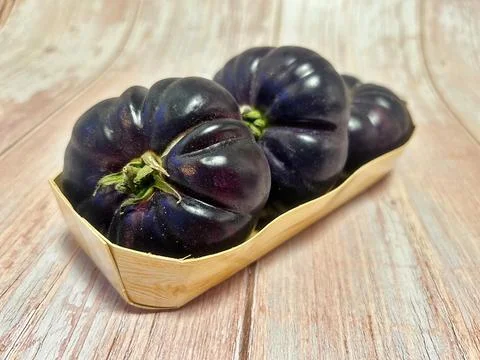 Black tomatoes Stock Photos