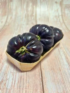 Black tomatoes Stock Photos