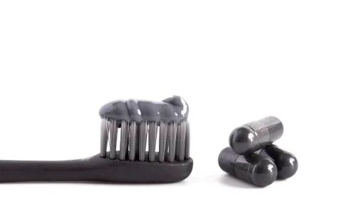 A Black Toothpaste with Capsule of Activated Charcoal Stock Photos