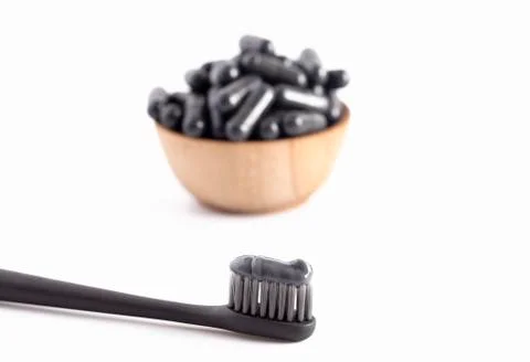 A Black Toothpaste with Capsule of Activated Charcoal Stock Photos