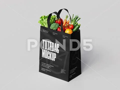 Black Tote Bag Mockup Filled with Fresh Organic Vegetables on Gray Background Modèle PSD