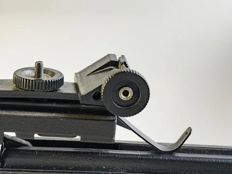 Black training crossbow with black string on a white background. Charging mec Stock Photos