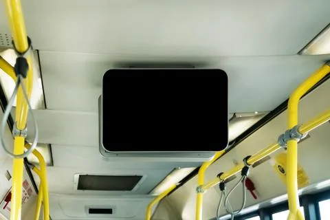Black TV without information inside the bus. Stock Photos