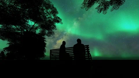 Black two men sit bench on white background. Black silhouette.Date under the Stock Footage 126041909