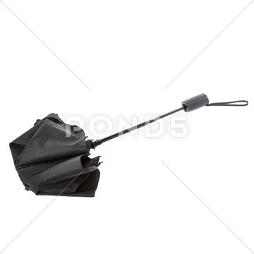Black umbrella isolated over the white background Stock Photos