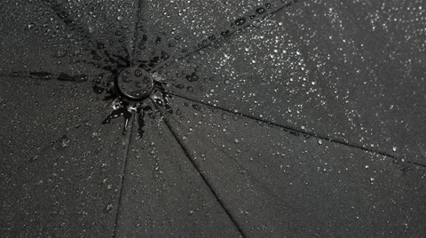 Black umbrella in the rain Stock Footage 56138599