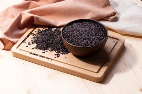 Black uncooked asian rice Stock Photos