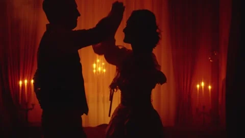 Black unrecognizable silhouette two gothic person, happy dancing together man Stock Footage 336323978