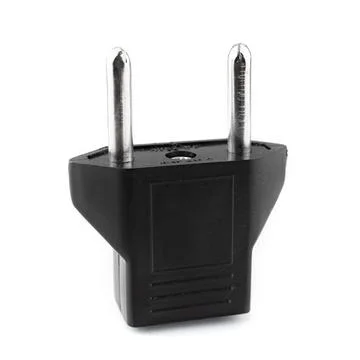 Black US to EU socket adapter and connector isolated on a white background, c Stock Photos
