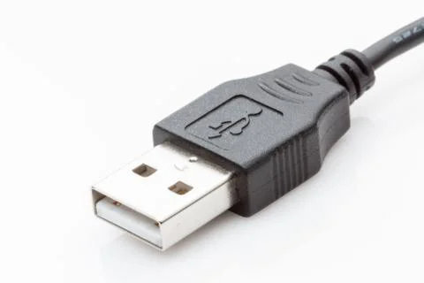 Black USB cable on a white background. Stock Photos