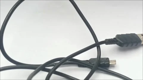 Black USB to Micro USB Data Charging Cable on White Background Stock Footage 335191675