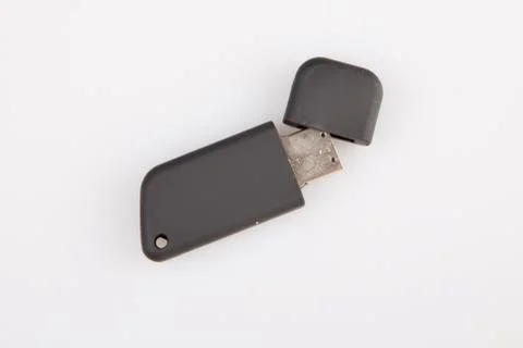 Black USB multifunction flash drive on white background Fotos de archivo