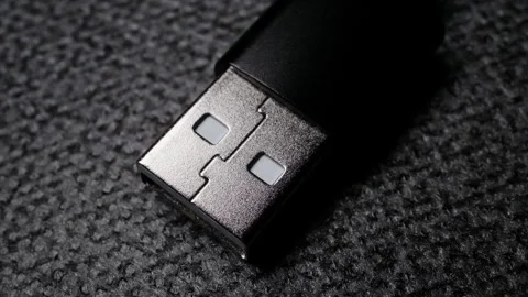 Black USB Type-A cable Plug Gradually Lighting up Macro Electronics Video Stock Footage 344218279