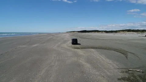 Black Van On Beach Stock Footage 169975592