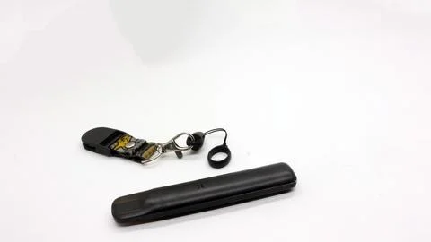 Black vape or electronic cigarette with hanger Stock Photos