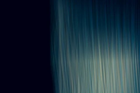 Black with vertically diagonal dimensional abstract waves background. Backdro Foto stock