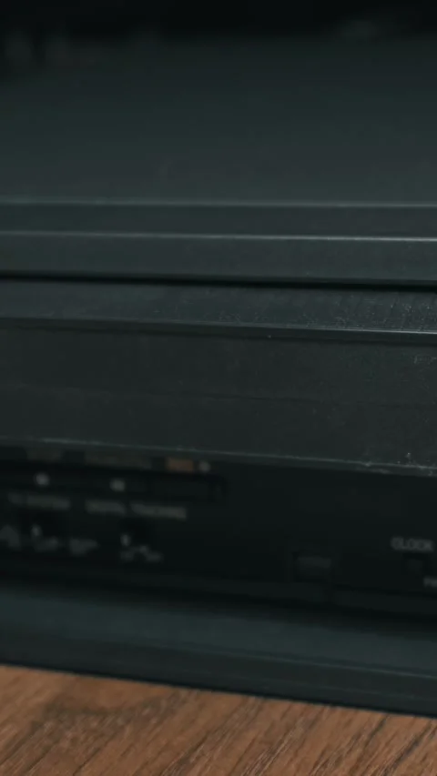 Black VHS Cassette Automatically Loading... | Stock Video | Pond5