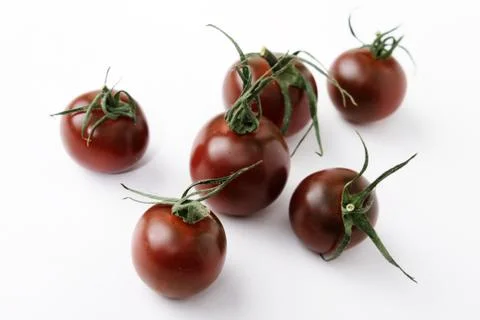 Black vine tomatoes Stock Photos