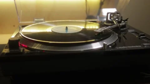Black vintage vinyl record playing on turntable Stock Footage 157081053