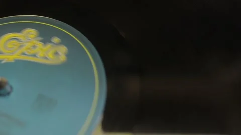 Black vinyl record playing on turntable Stock Footage 157081056