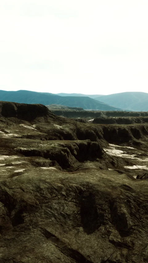 Black volcanic basalt rock formations in the low light Stock Footage 274723996