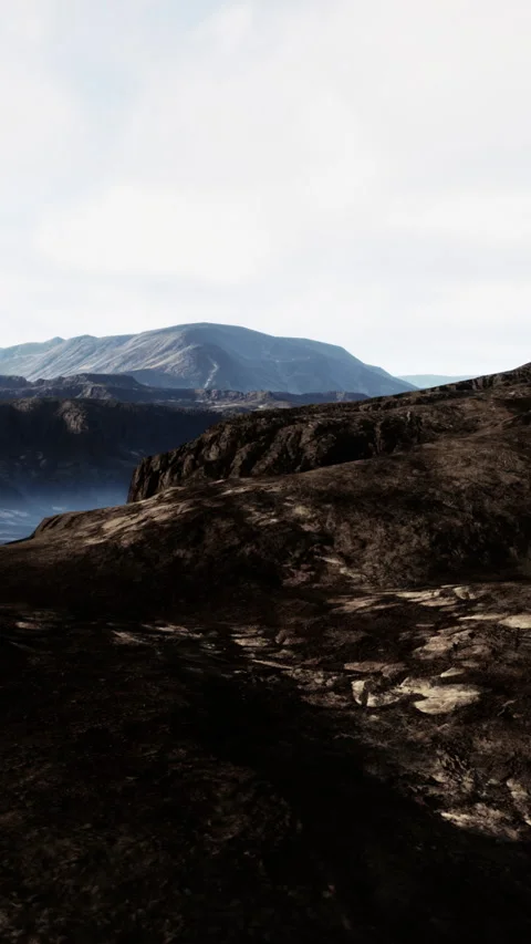 Black volcanic basalt rock formations in the low light Stock Footage 304525680