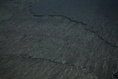 Black volcanic texture Stock Photos