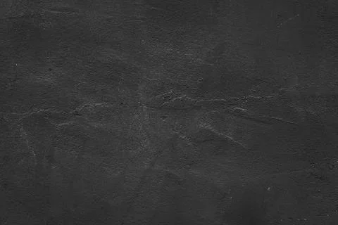 Black wall background and rough texture and surface Stock Photos