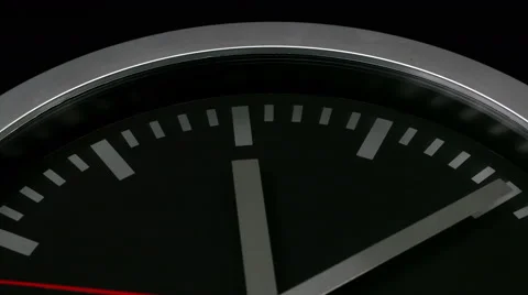 Black wall clock isolated on black backg... | Stock Video | Pond5