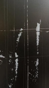 Black wall texture with white and grey lines and markings Stock Photos