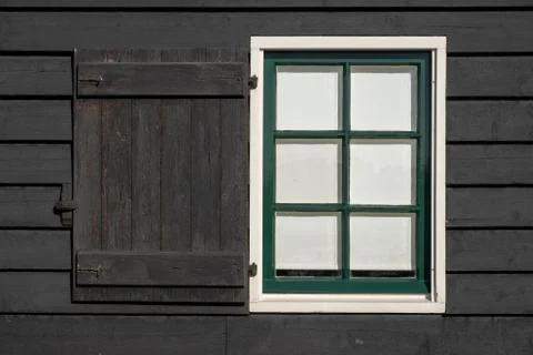 Black wall with white window frame Stock Photos
